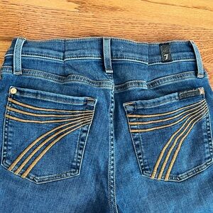 7 For All Mankind Women's Blue Jeans with Gold Stitching.